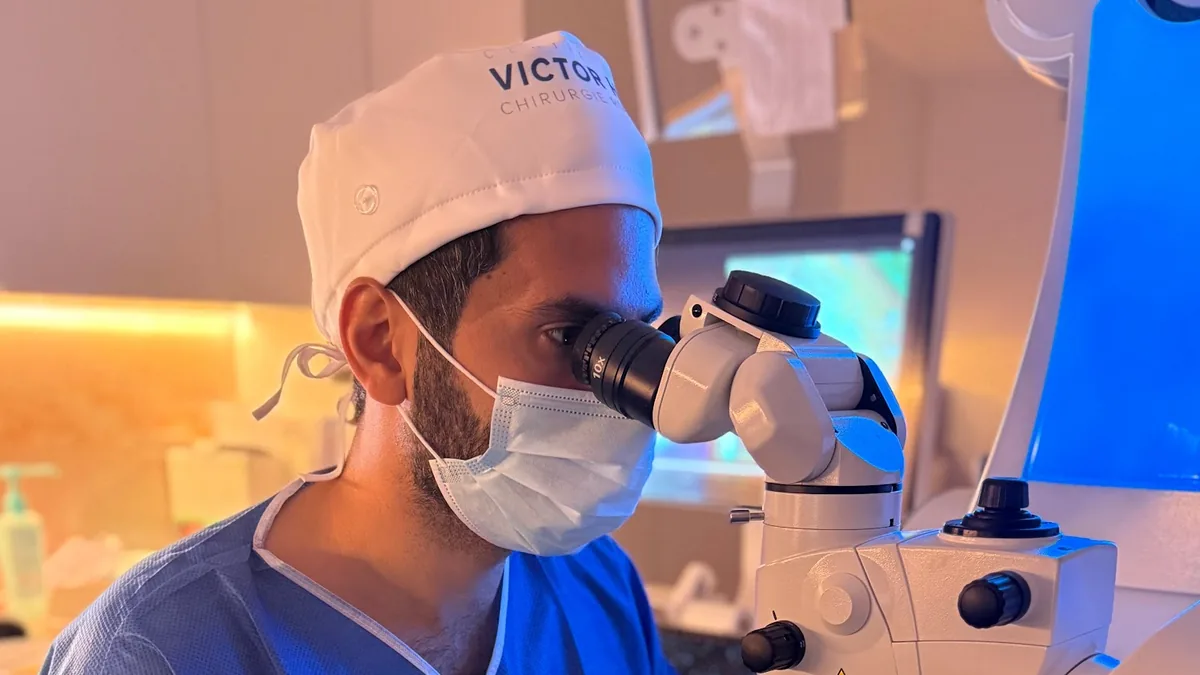 Dr Yoni Gozlan at the operating microscope in the Centre Laser Victor Hugo operating room, Paris